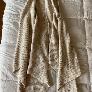 Flowy sleeveless open-front sweater